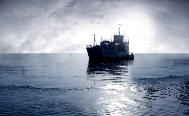 cargo ship sailing ocean